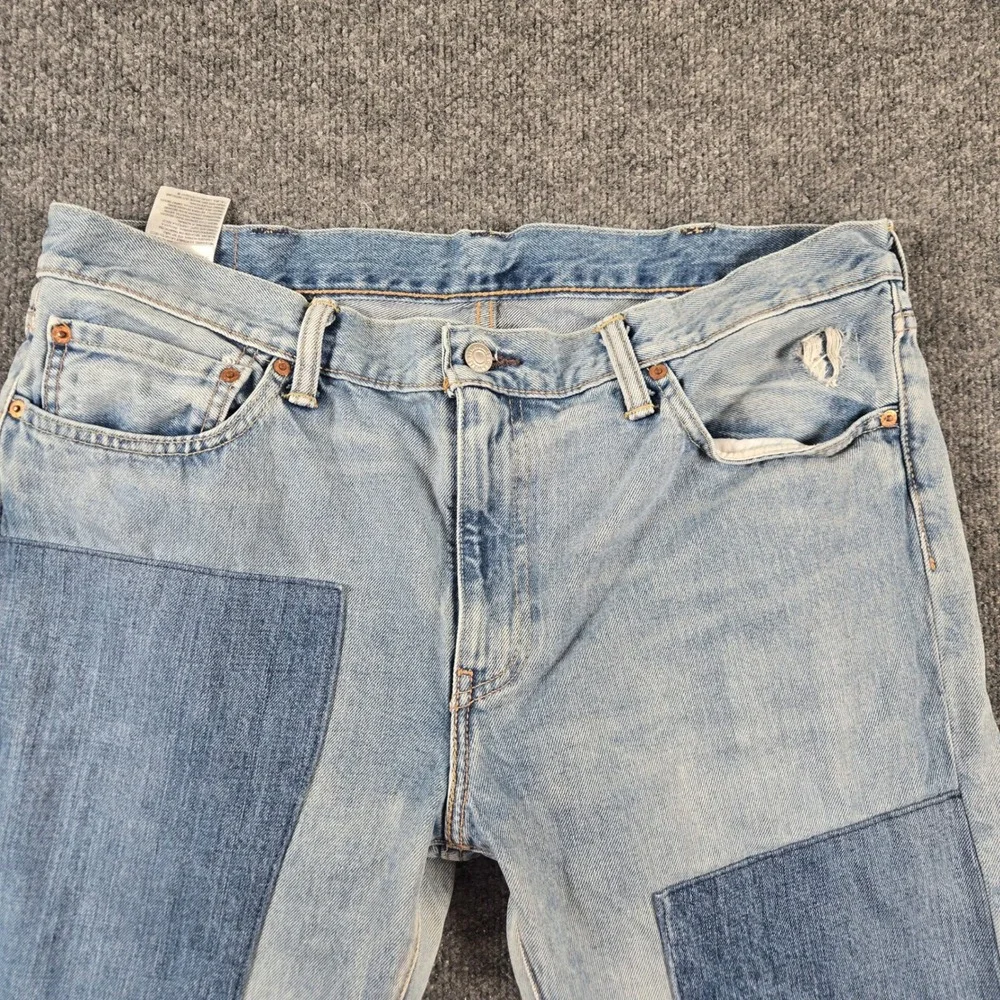 Levi's 511 Slim Jeans Mens 38x34 Light Blue Good Patchwork Distressed Denim y2k